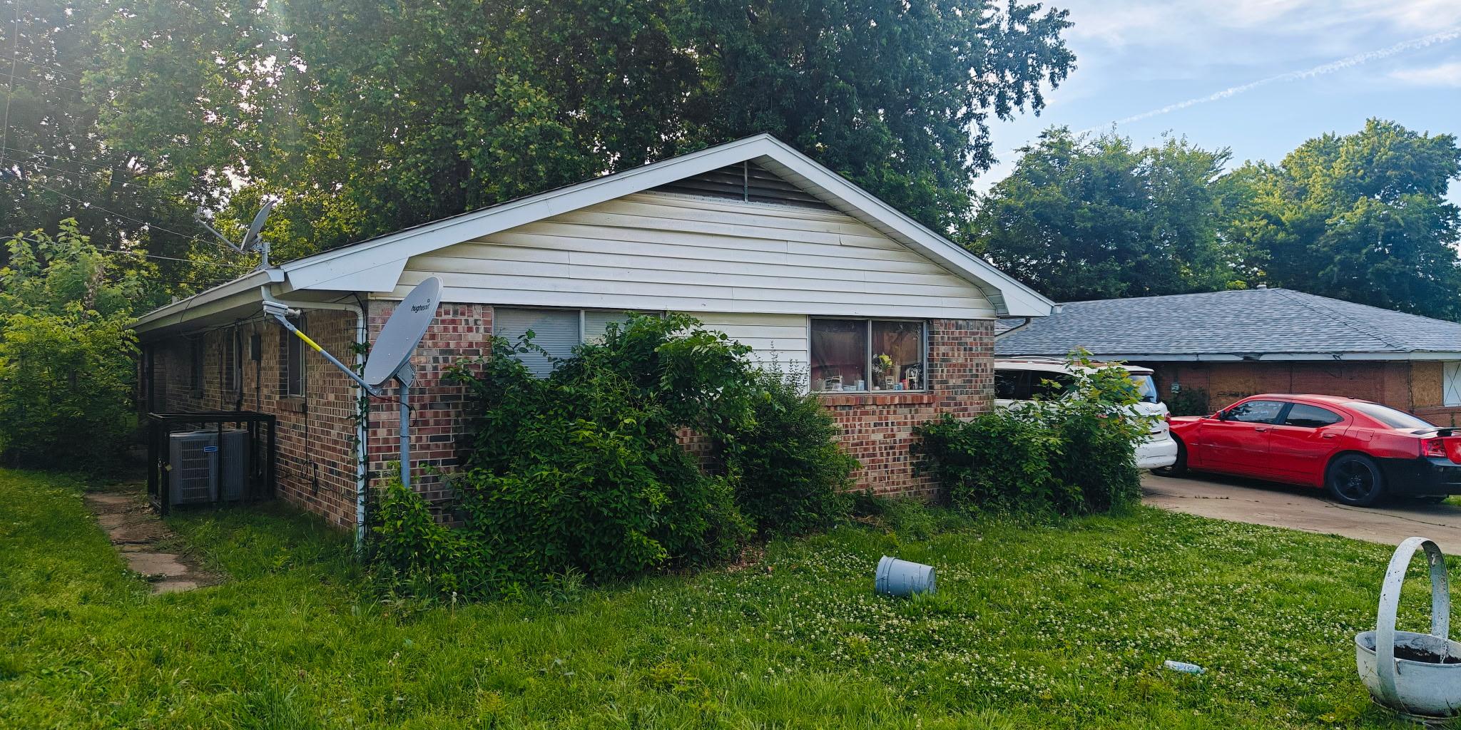 Front exterior with brick facade